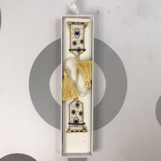 HANDMADE IWATCH BAND 42/44/45 GEOMETRICO BLANCO HUESO POMPONES DORADO