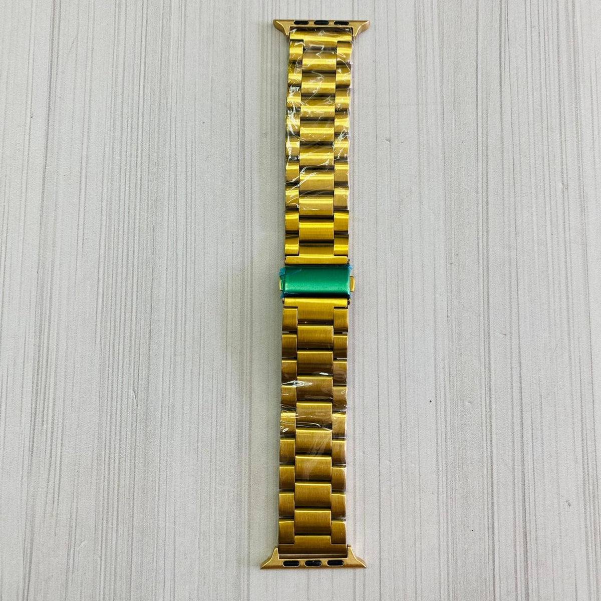 BANDA METALICA AJUSTABLE 42/44/45 - DORADA
