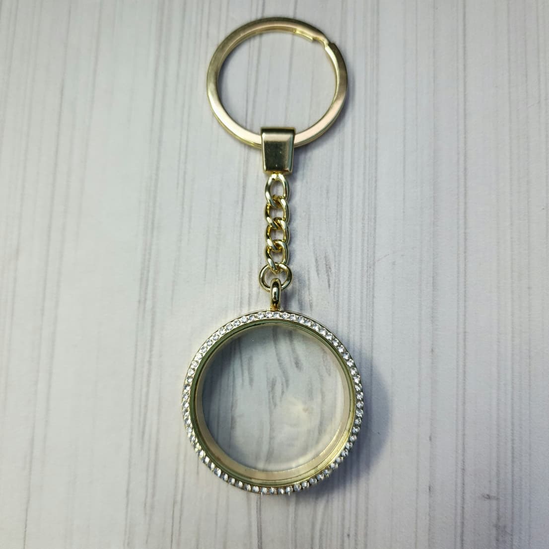 AIRTAG HOLDER DORADO
