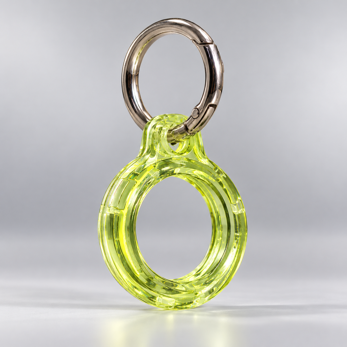 FUNDA PARA AIRTAG CON ARGOLLA - VERDE NEÓN TRANSLÚCIDO